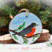 A hand-painted robin on a wood slice ornament that measures 3 1/2 inches x 3 1/2 inches at Cove Creek Photography.